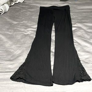 Stretchy black lace flare pants. Smoke free home. Light wear.